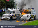 psni-armoured-vehicles-set-alight-by-petrol-bombs-during-riots-in-EH1W01.jpg